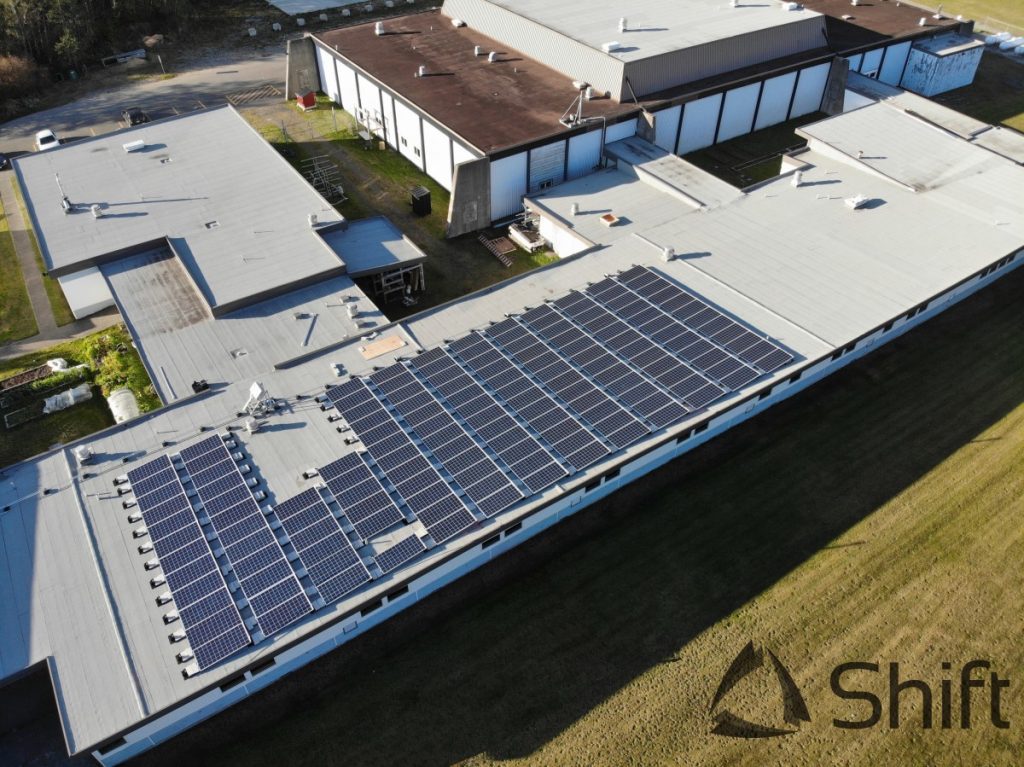 flat roof solar panel installation for remote BC school