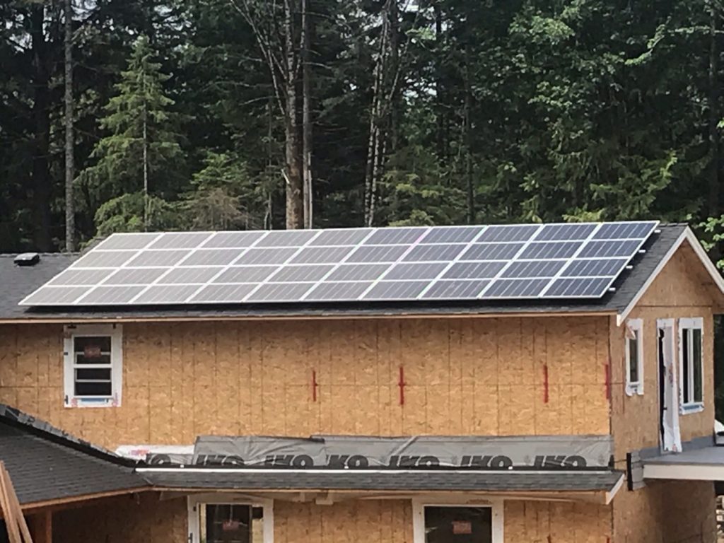 Rooftop solar panel installation on new construction in Nanaimo BC